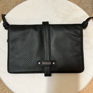 Roxy slim black purse, new without tags